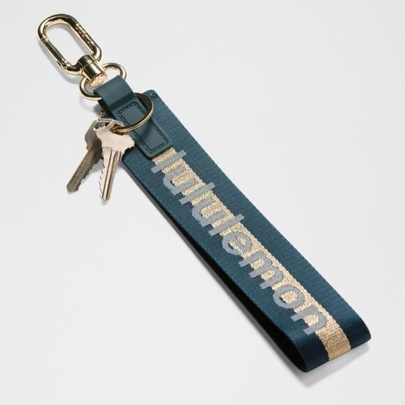 NWT Lululemon Never Lost Keychain Wordmark Warp Teal/Gold - Picture 1 of 3
